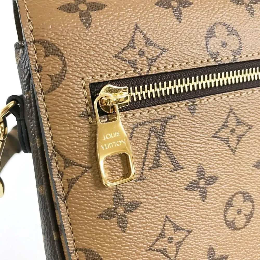 Pochette Métis Reverse Monogram canvas - Picture 6 of 14